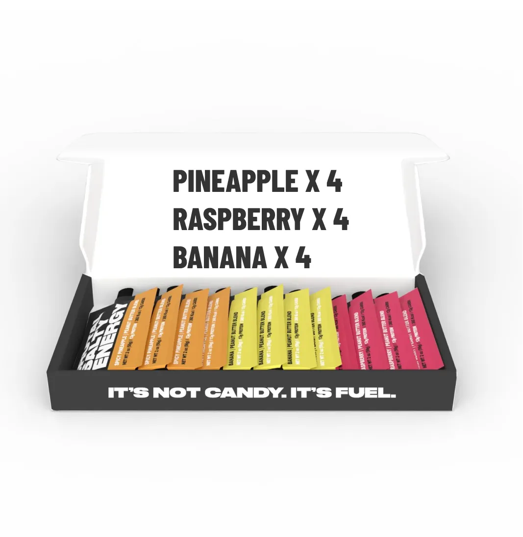 Box of energy bars with flavors Pineapple, Raspberry, and Banana on a white background.